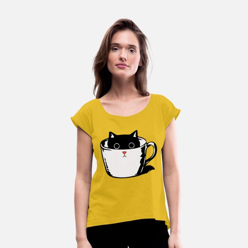 Black kitten with red nose hiding in a cup