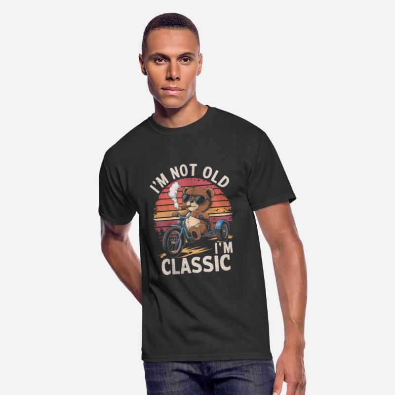 Teddy bear with sunglasses on tricycle with cigar